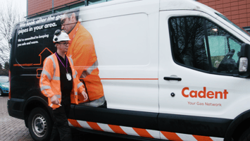 Man working with Cadent stood next to work van. 