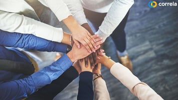 Hands all coming together showing unity and togetherness