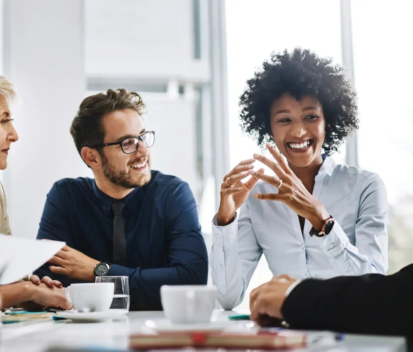 people chatting in meeting