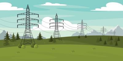 An image of pylons that are spread across a scenic background with mountains